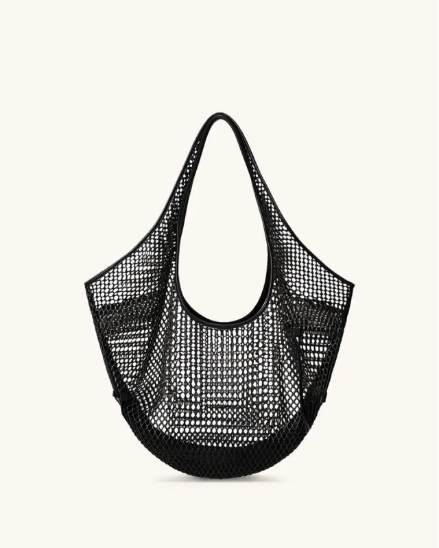 Lily Perforated Crescent Bag - Black sold by JW PEI