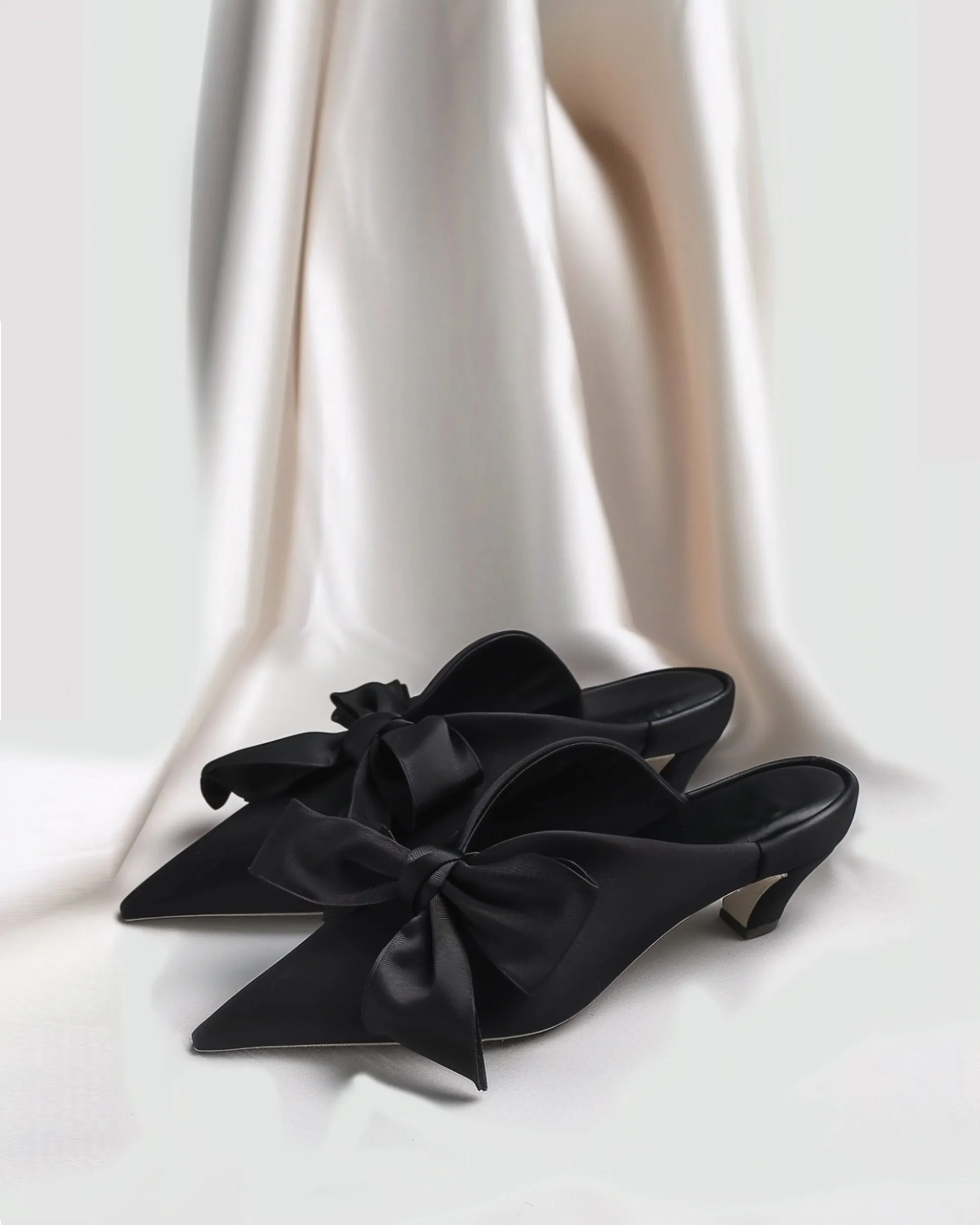 Sophia Bow-Embellished Satin Mules - Black sold by JW PEI