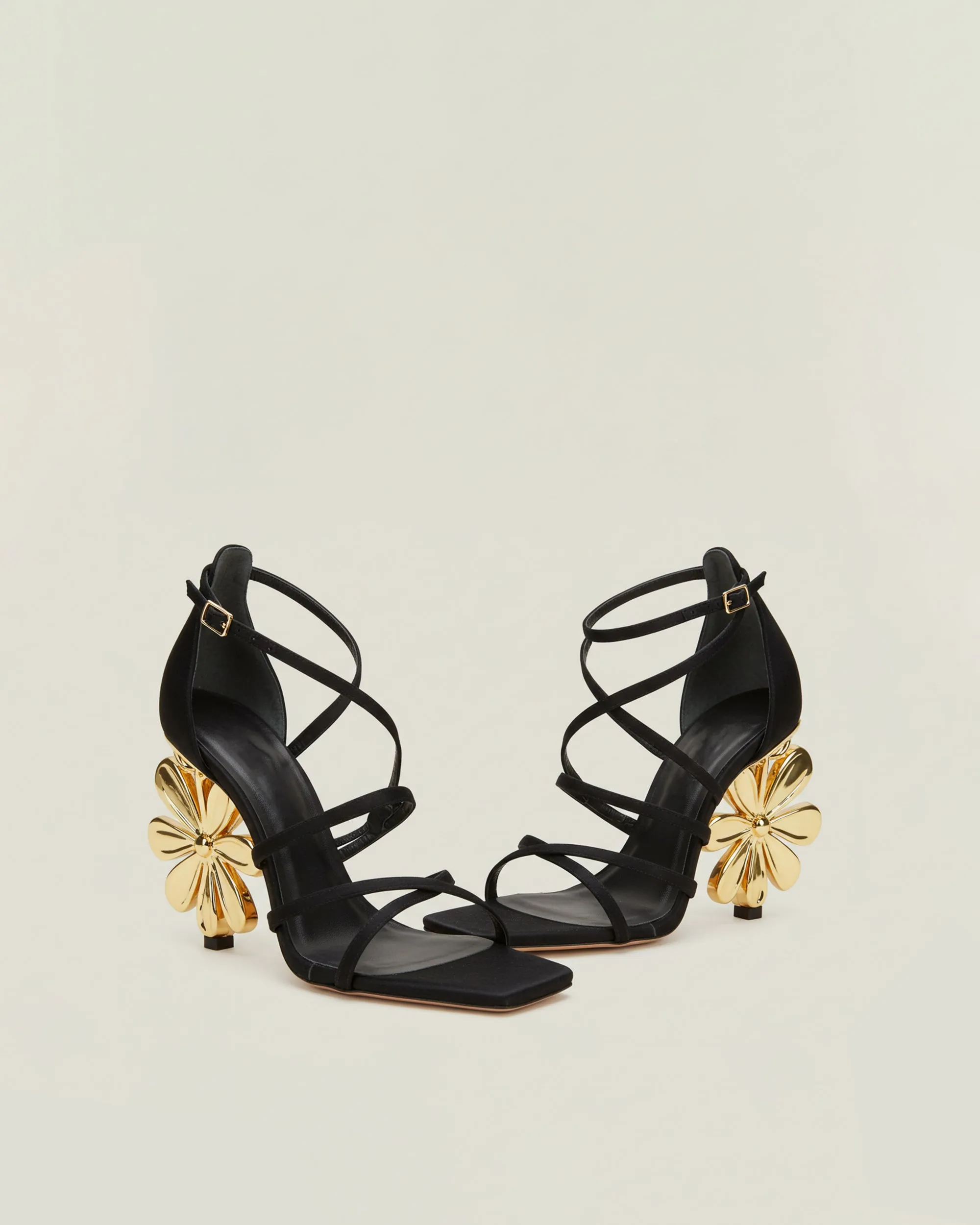 Everly Metallic Flower Heeled Sandals - Black sold by JW PEI