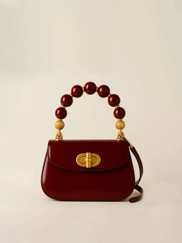 Ava Beaded Top Handle Bag - Burgundy sold by JW PEI