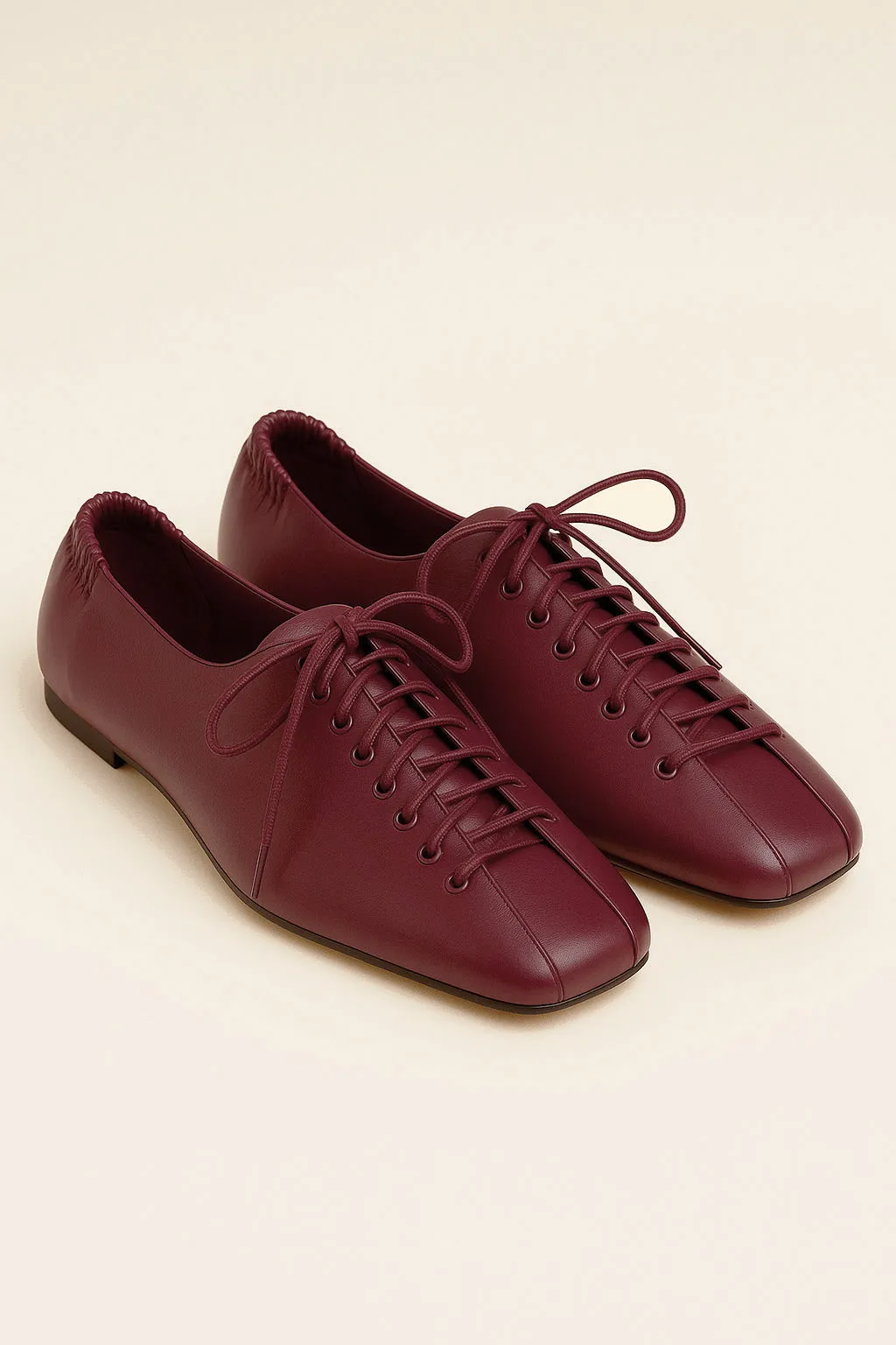 Ruby Lace-Up Flats – Red sold by JW PEI