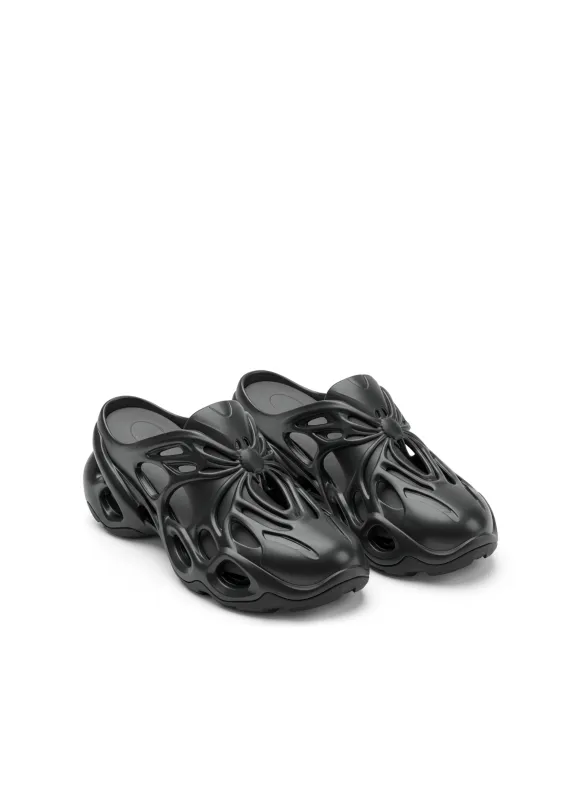 Nova Sculpted Mules – Black sold by JW PEI