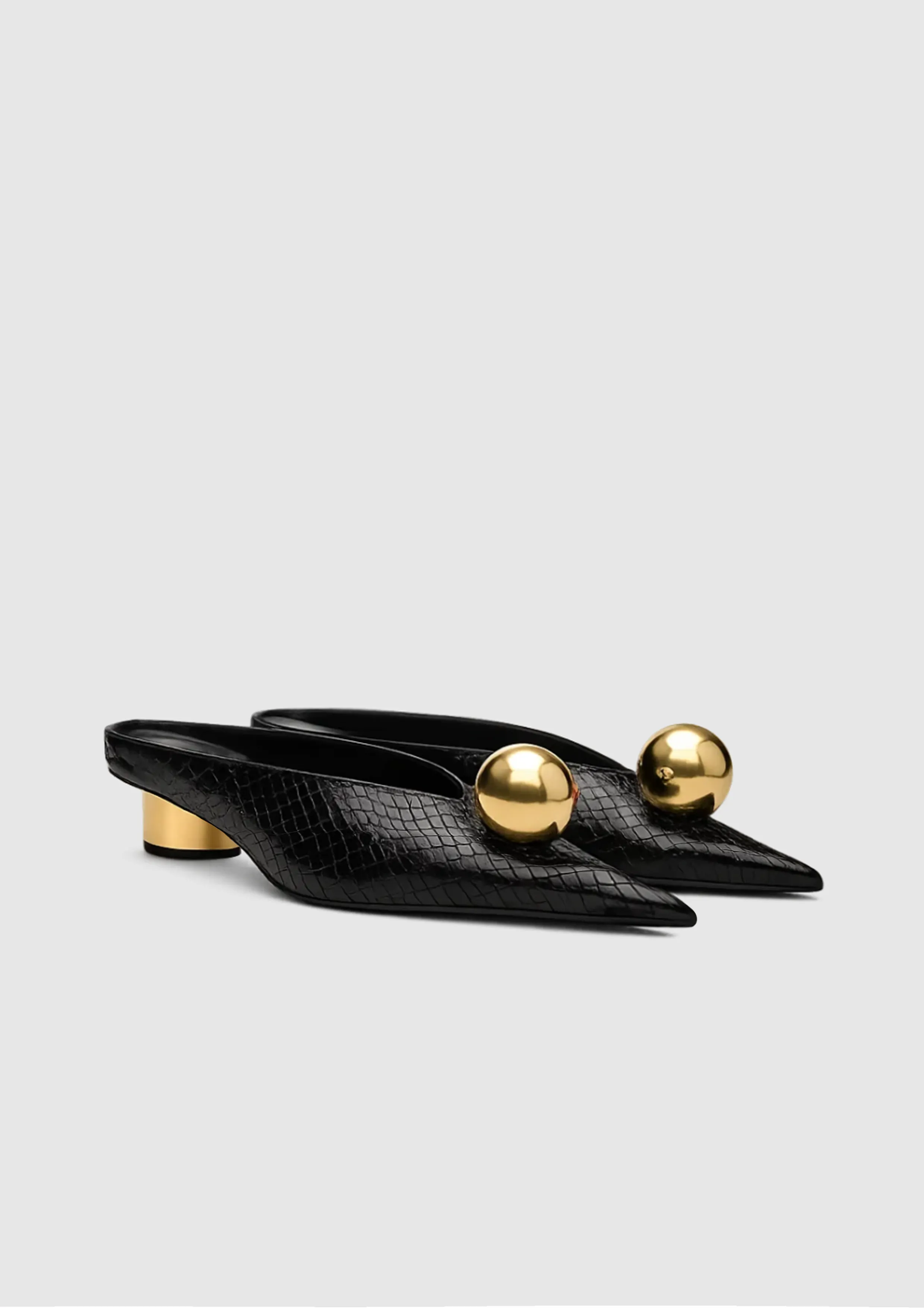 Naomi Gold Orb Mules – Black sold by JW PEI