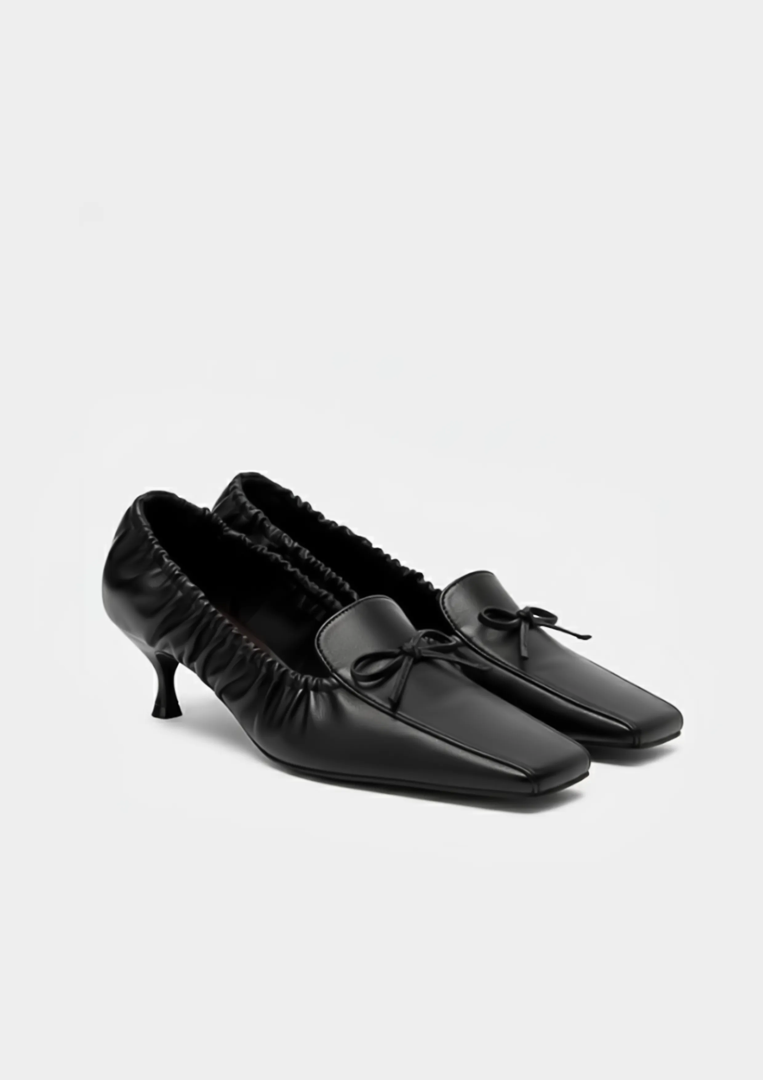 Lila Bow Kitten Pumps – Black sold by JW PEI