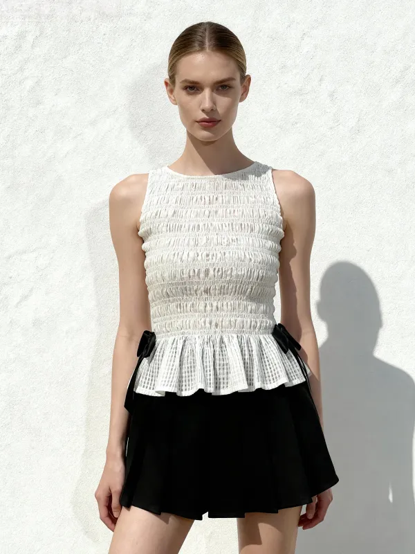 Smocked Peplum Sleeveless Top - White sold by JW PEI