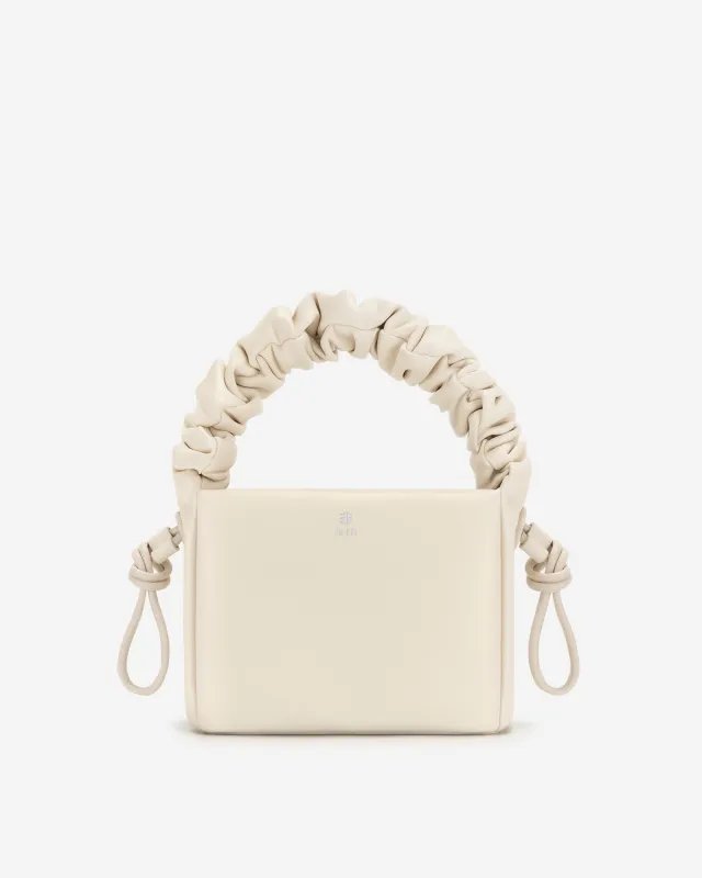 Rylee Pleated Drawstring Top Handle Bag - Off White sold by JW PEI