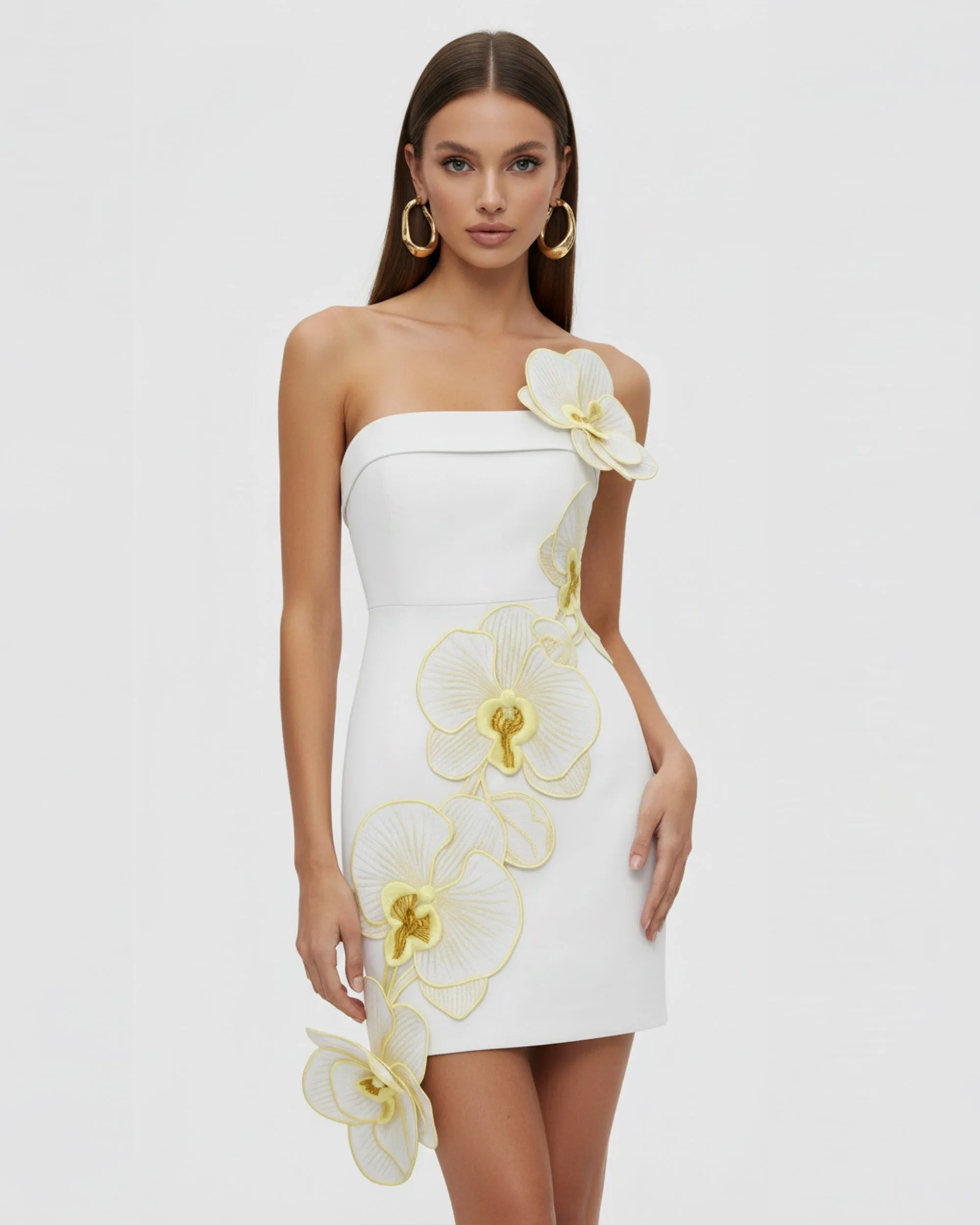Orchid Embroidered
Floral Appliqué
Strapless Mini Dress-
White Yellow sold by JW PEI