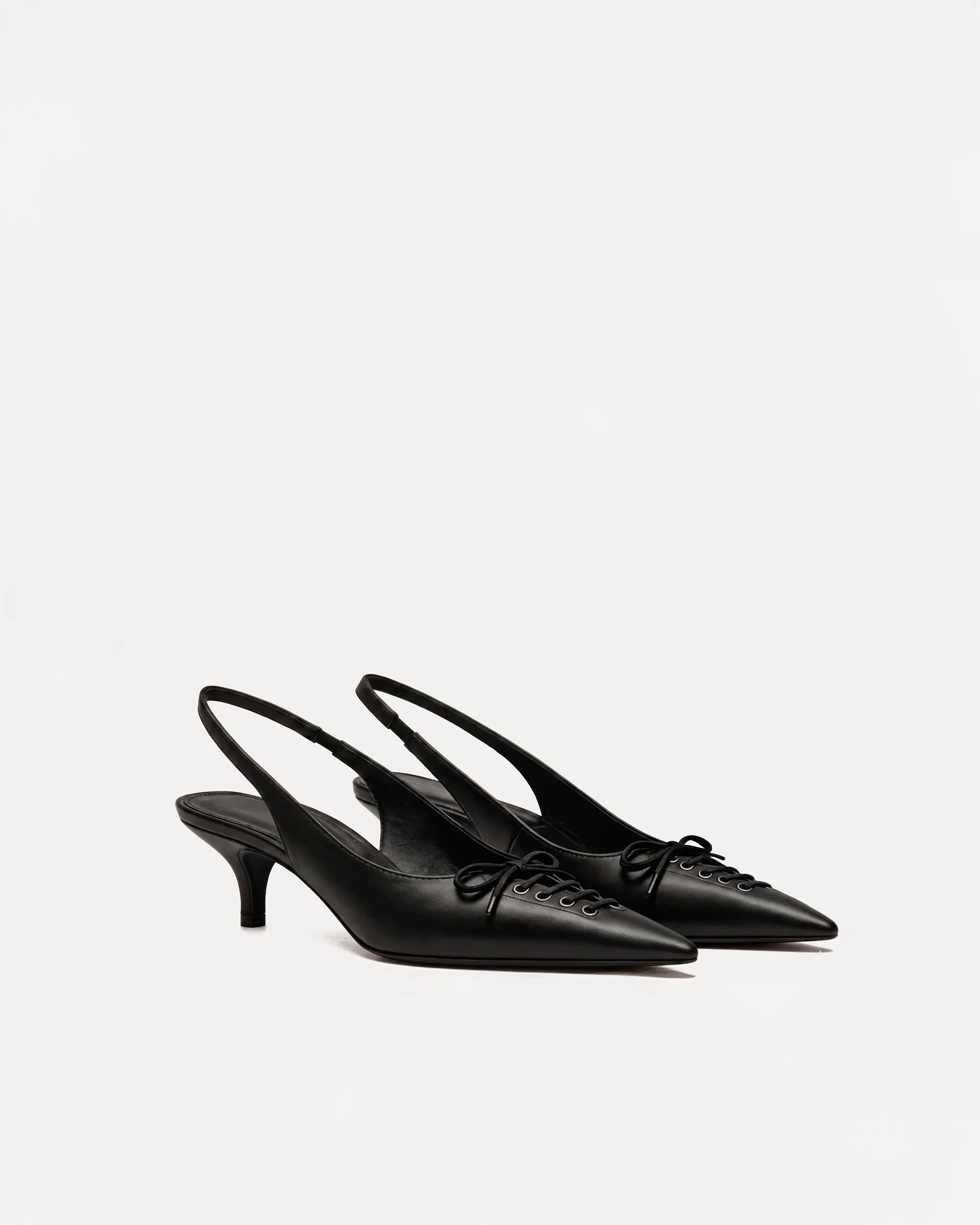 Ashley Slingback Pumps – Black sold by JW PEI