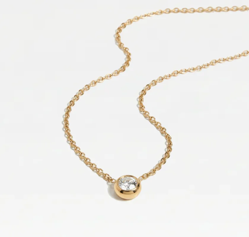 The Solitaire Bezel Necklace sold by The M Jewelers