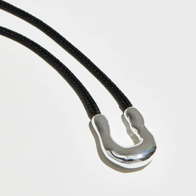 The Lea Cord Pendant Necklace sold by The M Jewelers