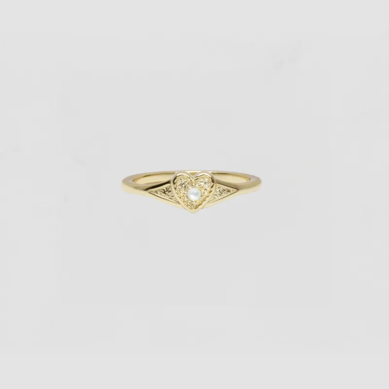 The Dainty Pearl Heart Heirloom Ring sold by The M Jewelers