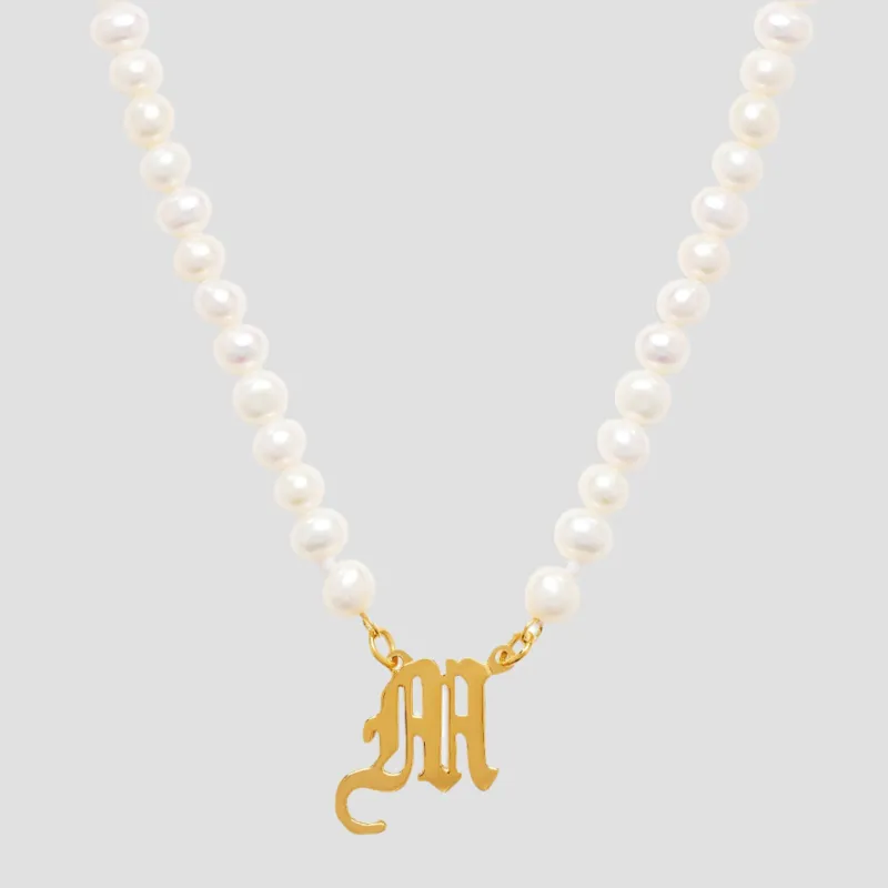 The Old English Single Initial Pearl Necklace sold by The M Jewelers