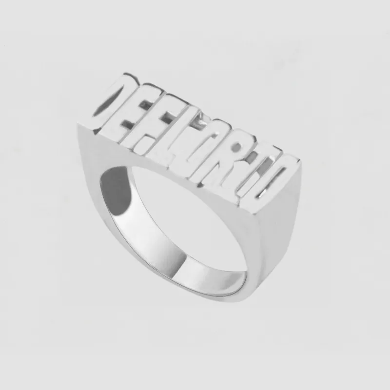 The Block Name Ring sold by The M Jewelers