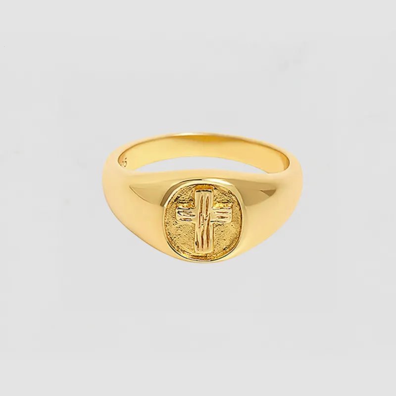 The Embossed Cross Signet Ring sold by The M Jewelers