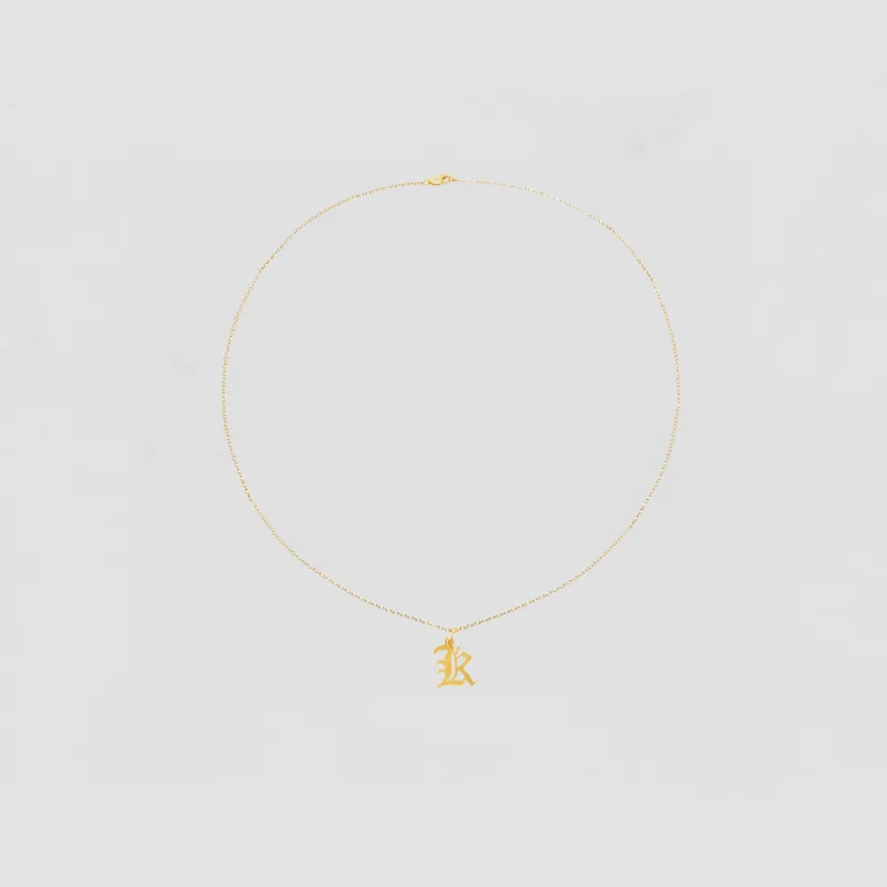 The Mini Old English Initial Pendant Necklace sold by The M Jewelers