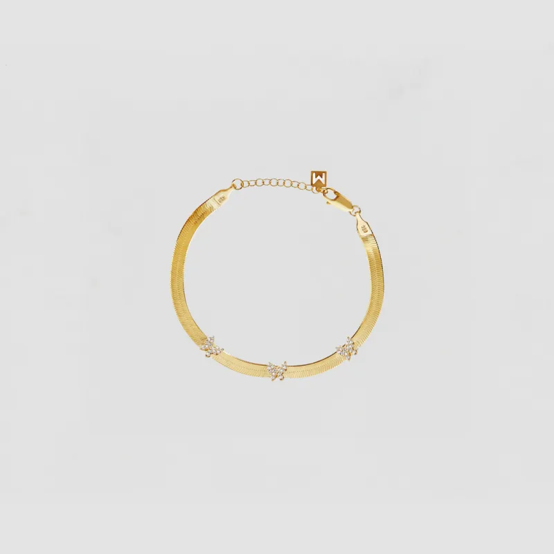 The Pavé Butterfly Herringbone Bracelet sold by The M Jewelers