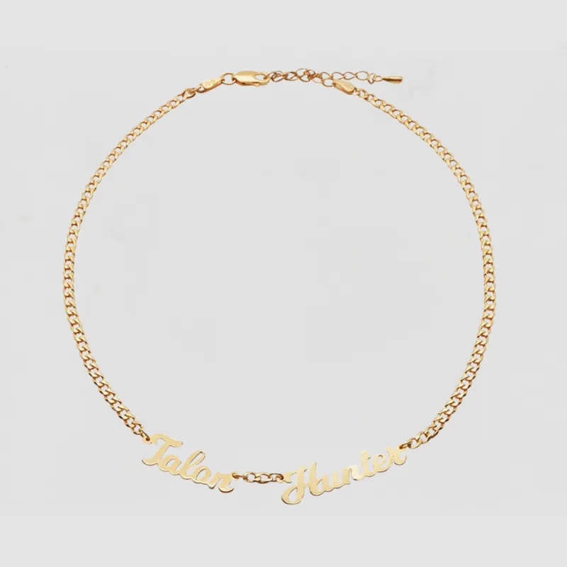 The Double Script Nameplate Necklace sold by The M Jewelers