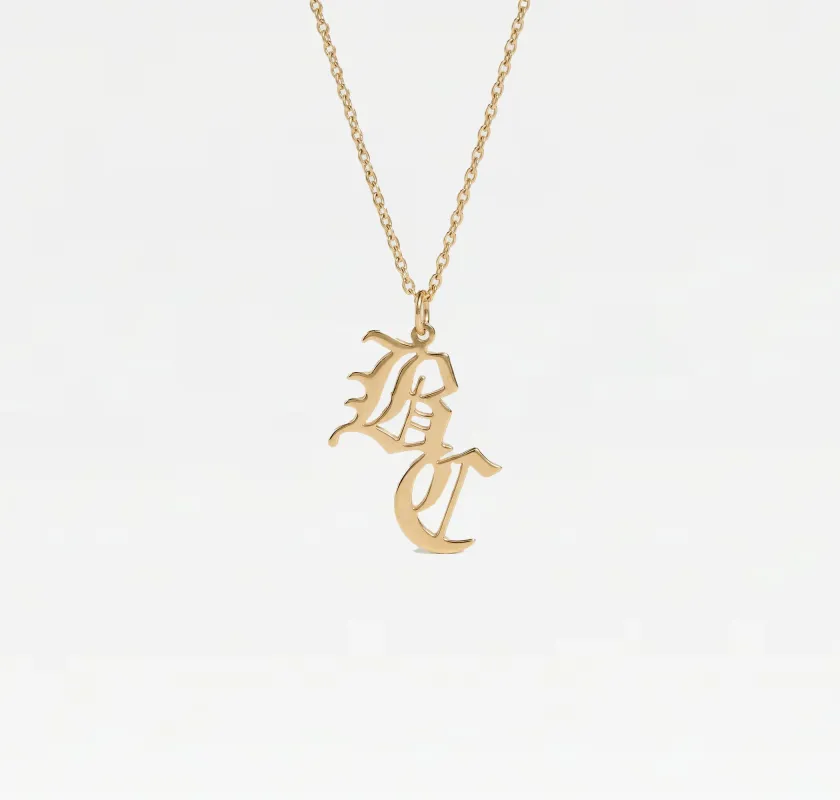 The Double Old English Pendant sold by The M Jewelers