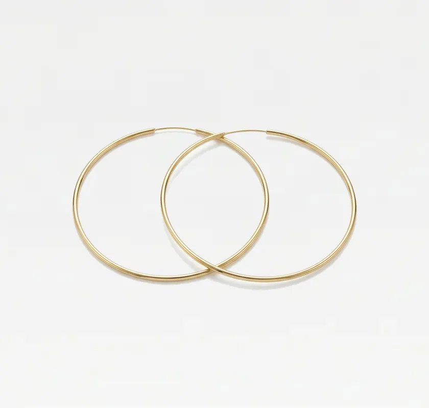 The Thin Large Hoops sold by The M Jewelers