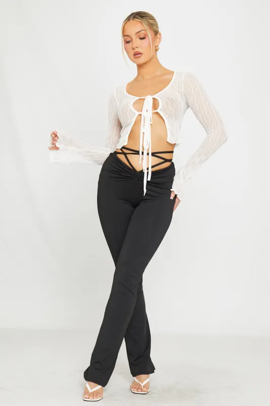 White Sheer Ruffle Detail Tie Front Long Sleeve Top sold by Nothingbutstyle