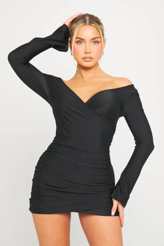 Black Plunge Ruched Long Sleeve Wrap Mini Dress sold by Nothingbutstyle
