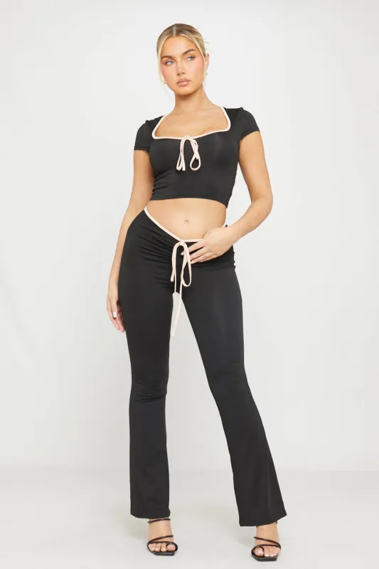 Black Contrast Tie Front Ruched Flared Trousers sold by Nothingbutstyle