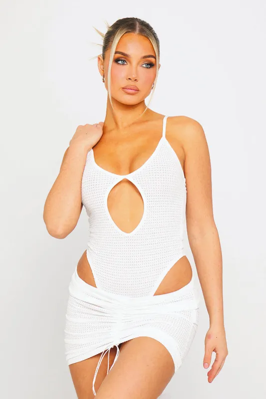 White Sheer Knit Keyhole Bodysuit & Ruched Mini Skirt Co-Ord sold by Nothingbutstyle