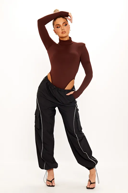 Brown High Neck Shoulder Padded Open Back Bodysuit sold by Nothingbutstyle