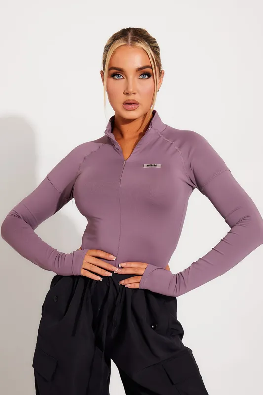 Purple High Neck Zip Sportline Long Sleeve Top sold by Nothingbutstyle