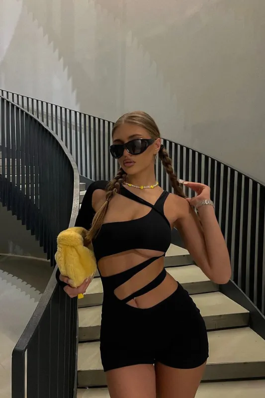 Black Asymmetric Cut Out Detail Playsuit sold by Nothingbutstyle