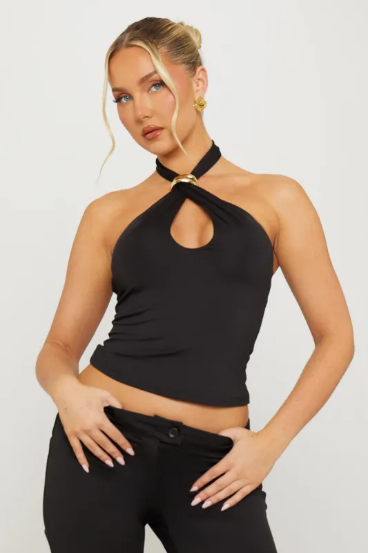 Black Halterneck Cross Over Detail Crop Top sold by Nothingbutstyle