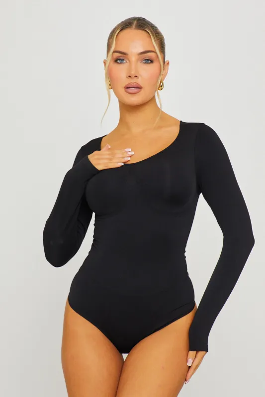 Black Seamless Sculpting Long Sleeve Bodysuit sold by Nothingbutstyle