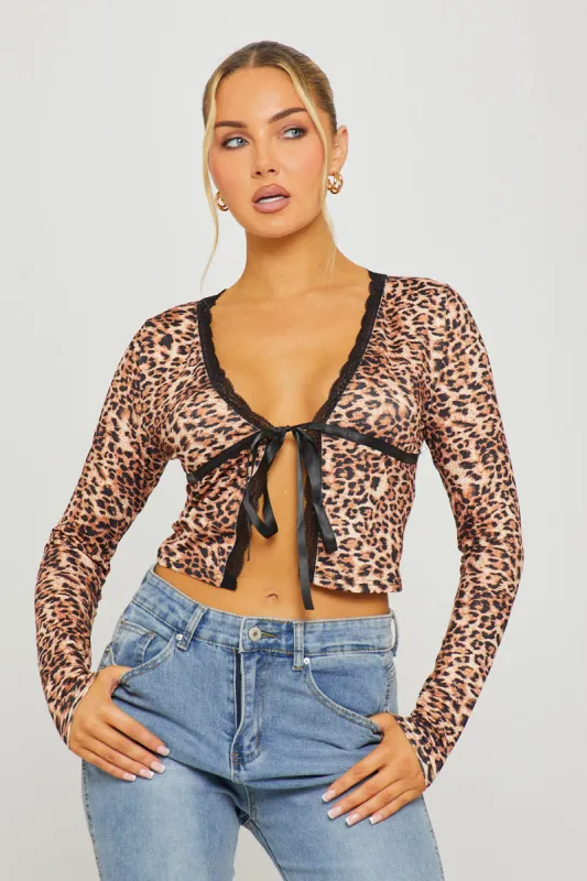 Leopard Print Lace Trim Tie Front Split Detail Top made by Nothingbutstyle