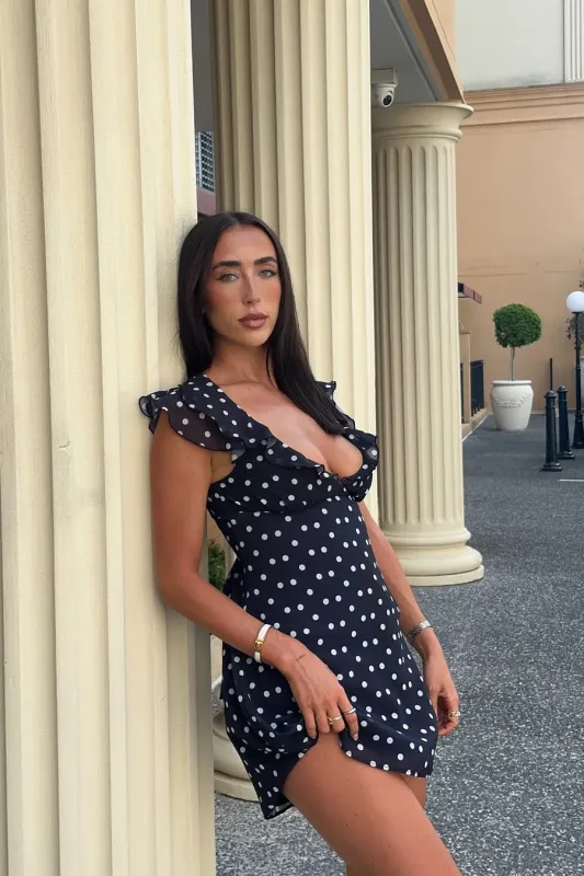 Black Polka Dot Ruffle Trim Mini Dress sold by Nothingbutstyle