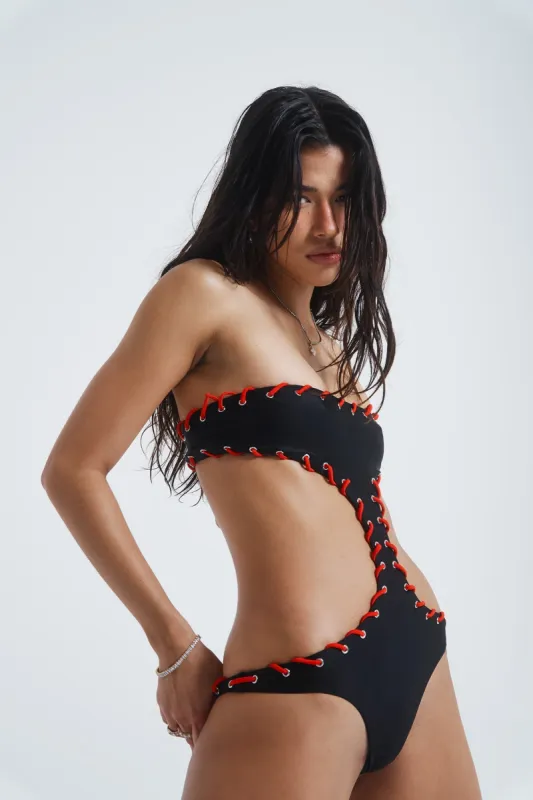 WAG Behaviour Cut Out Bodysuit sold by Jaded London