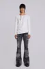 Washed Black Drift Flared Jeans sold by Jaded London