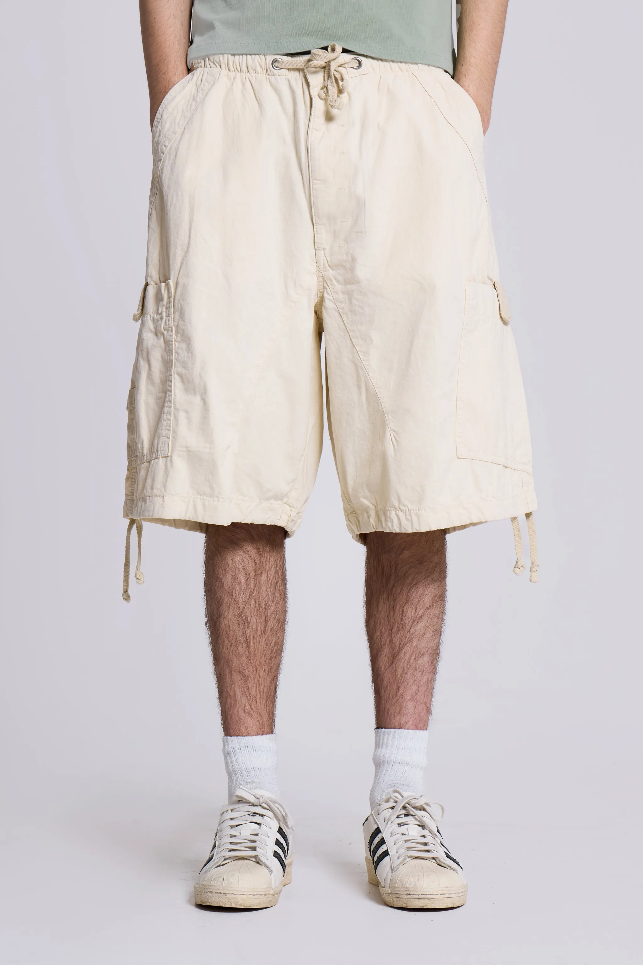 Ecru Parachute Cargo Shorts sold by Jaded London