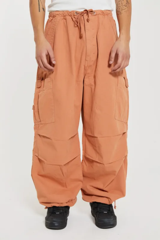 Rust Orange Parachute Cargo Pants sold by Jaded London