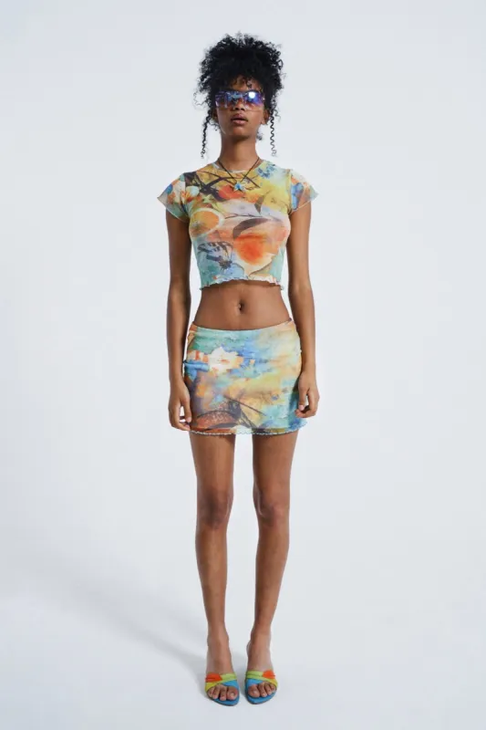 Citrus Mesh Mini Skirt sold by Jaded London