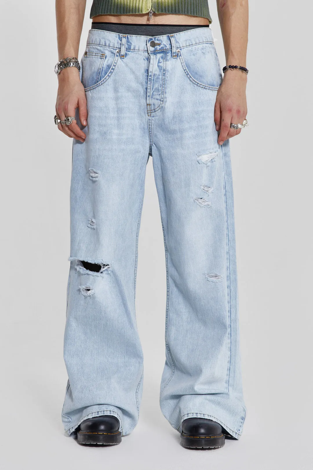 Bleached Blue Colossus Flare Jeans sold by Jaded London