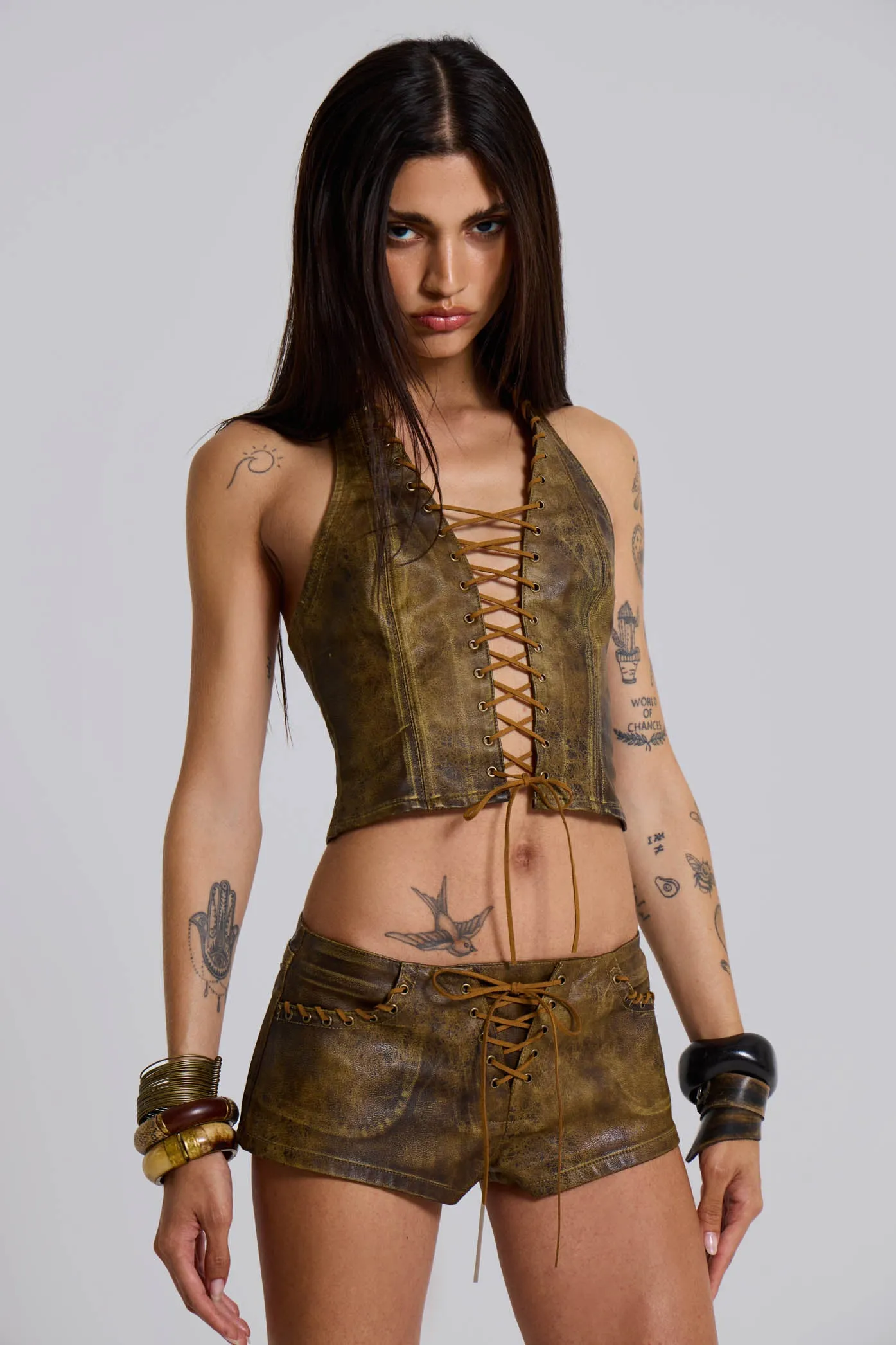 Vaca Whipstitch Faux Leather Corset sold by Jaded London