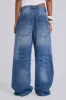 Nailed Studded Colossus Jeans in Vintage Blue Wash sold by Jaded London