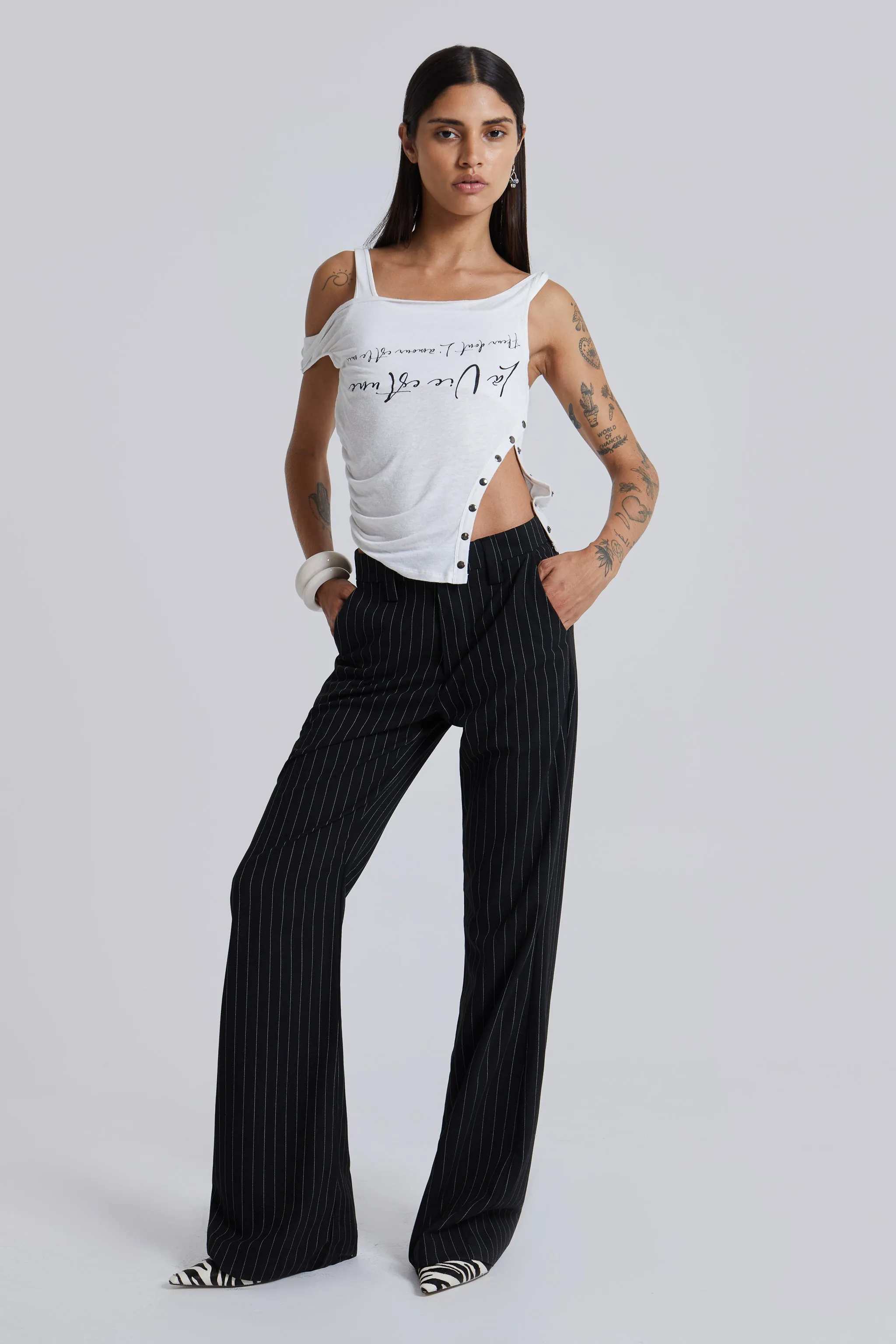 Black Pinstripe Stacked Bootcut Suit Pants sold by Jaded London