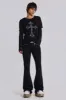 Jet Black Studded Drift Flared Jeans sold by Jaded London