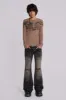 Dune Drift Flared Jeans sold by Jaded London