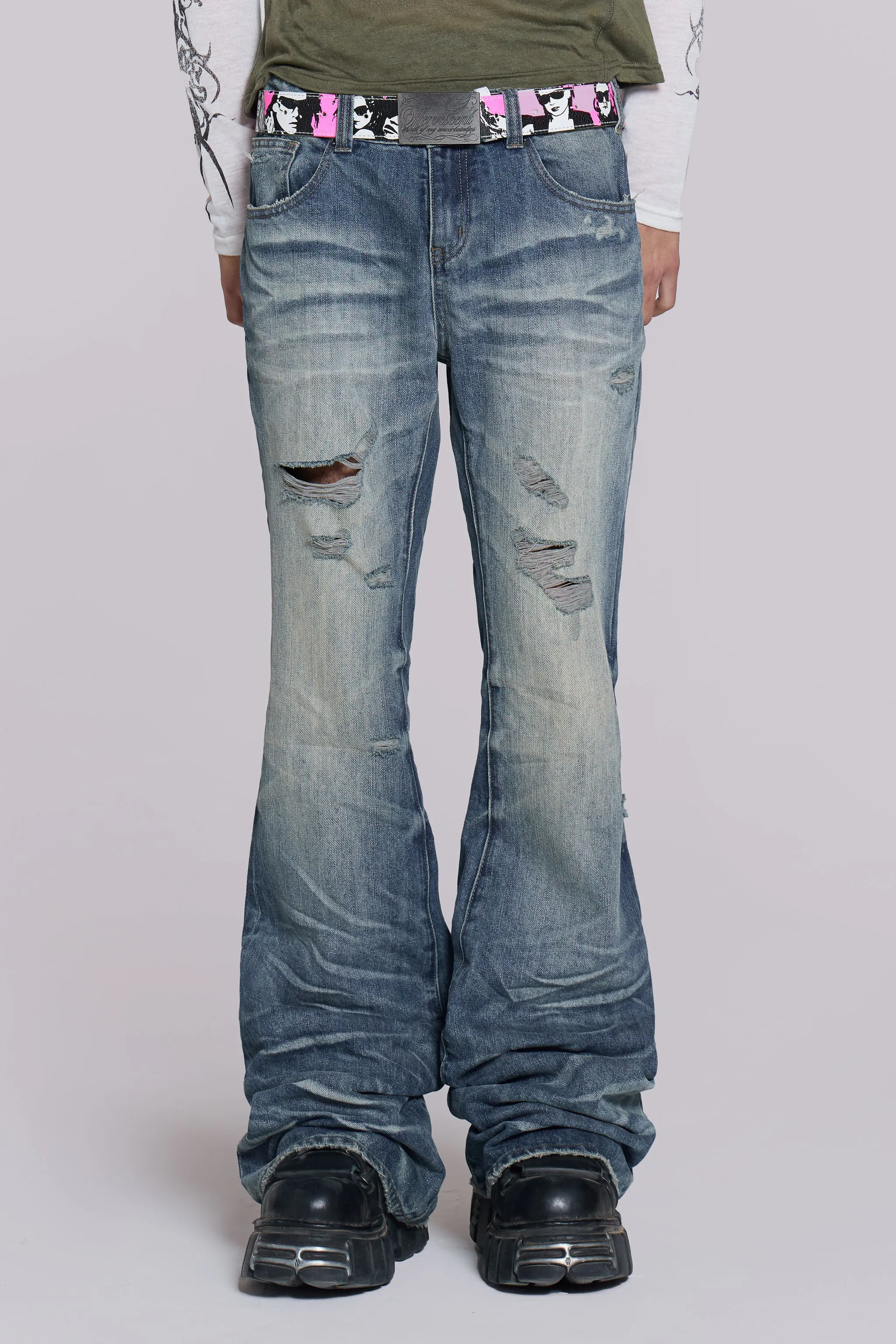 Mid Blue Distressed Creased Drift Flared Jeans sold by Jaded London