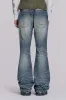 Mid Blue Distressed Creased Drift Flared Jeans sold by Jaded London