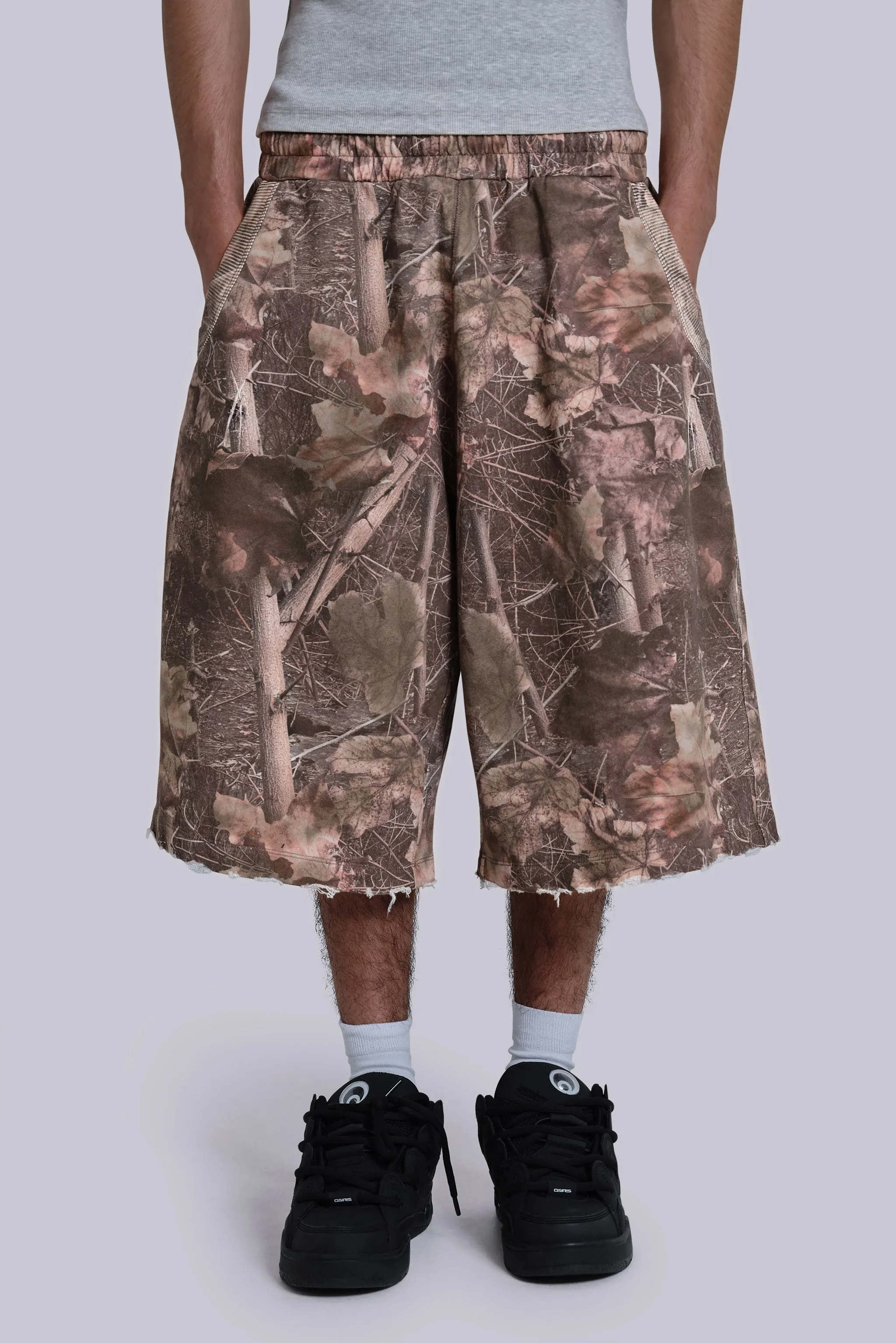 Woodland Camo Monster Jogger Shorts sold by Jaded London