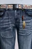 Vintage Blue Feather Drift Flared Jeans sold by Jaded London