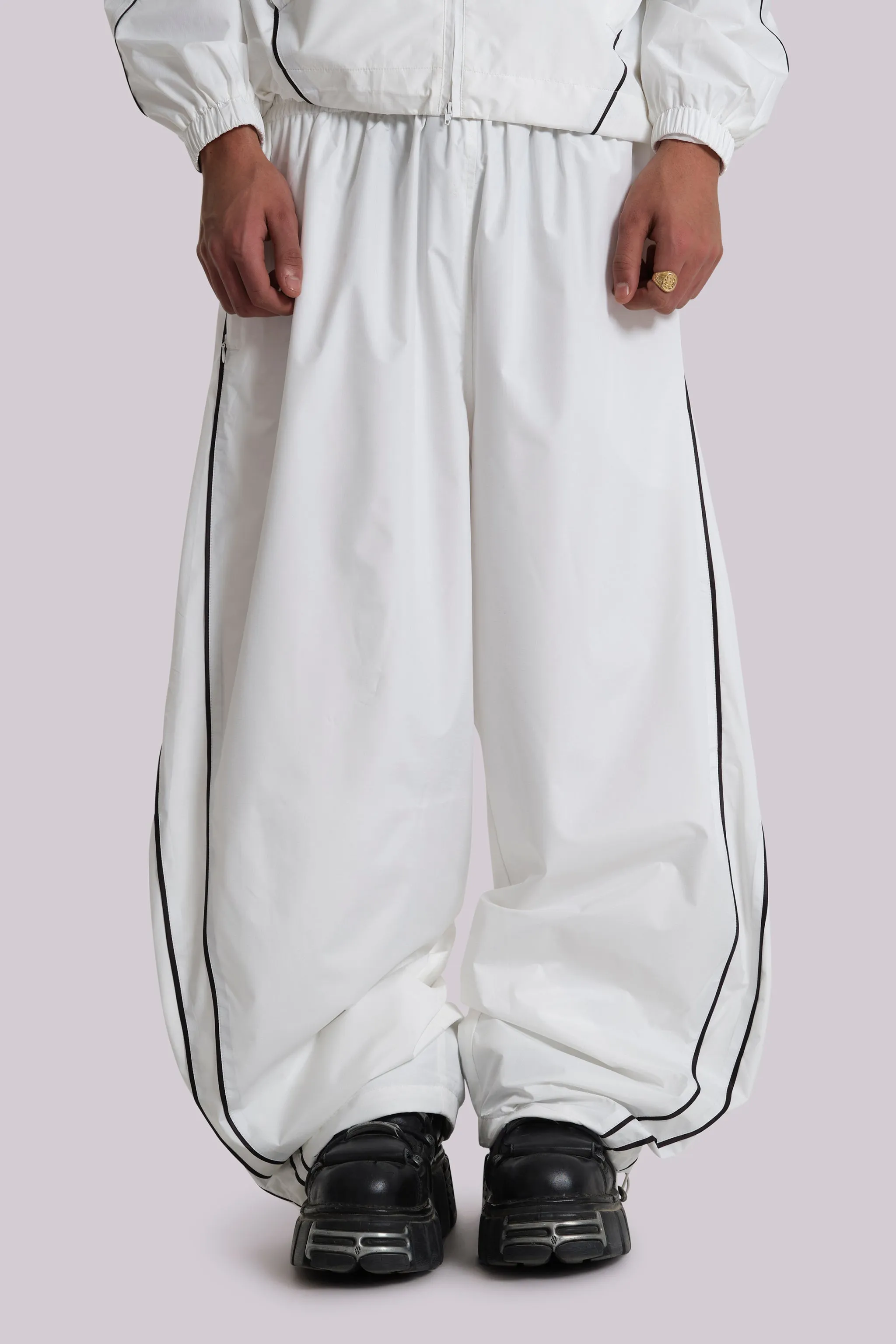 White Vapor Tracksuit Bottoms sold by Jaded London